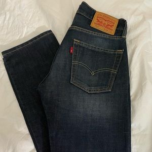LEVI’S MID RISE MOM JEANS